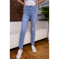 Рвані жіночі джинси скінні блакитного кольору 164R681