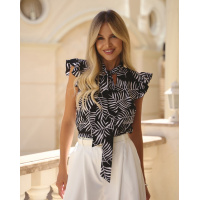 Черно-белая блуза с рюшами и бантом