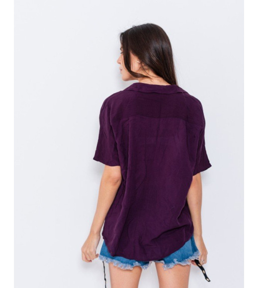 Фіолетова вільна блуза з воланами