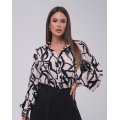 Черно-бежевая принтованная рубашка с объемными рукавами