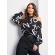 Черная принтованная блуза с открытым плечом
