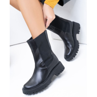 Высокие челси из натуральной кожи на меху