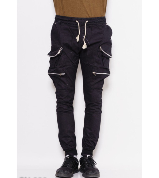 Черные джинсовые брюки с резинками-манжетами и молниями на карманах