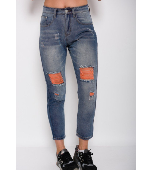 Синие джинсы бойфренды с оранжевой перфорацией и потертостями