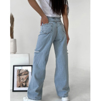 Голубые широкие джинсы с боковыми разрезами