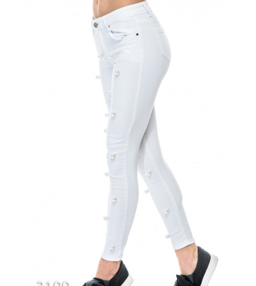 Білі джинси з великим штучним перлами
