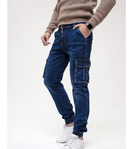 Синие джинсы джоггеры с карманами