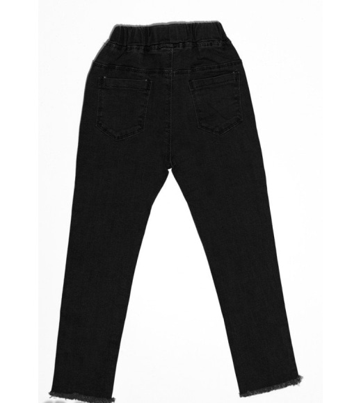 Чорні джинси з рваною перфорацією і бахромою по низу