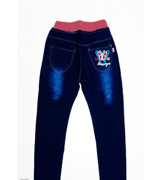 Темно-синие джинсы на резинке с вышивкой и потертостями