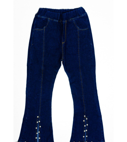 Синие джинсы модели клеш с клиньями и бусинами