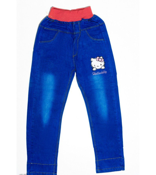 Сині джинси на рожевій гумці з нашивками і потертостями