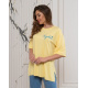 Желтая удлиненная футболка с надписью