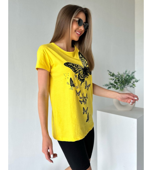 Жовта футболка з принтом і мереживним метеликом