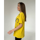 Жовта подовжена футболка з принтом