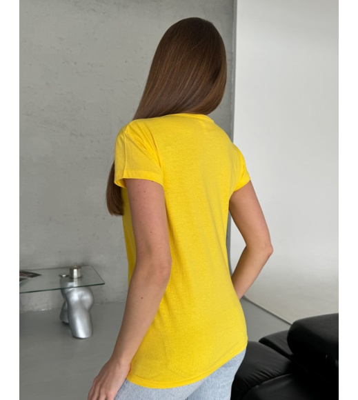 Жовта бавовняна футболка з яскравим малюнком