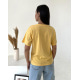 Желтая трикотажная футболка с вышитым декором