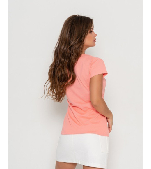 Персикова бавовняна футболка з написами і яскравим принтом