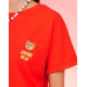Красная хлопковая свободная футболка с нашивкой