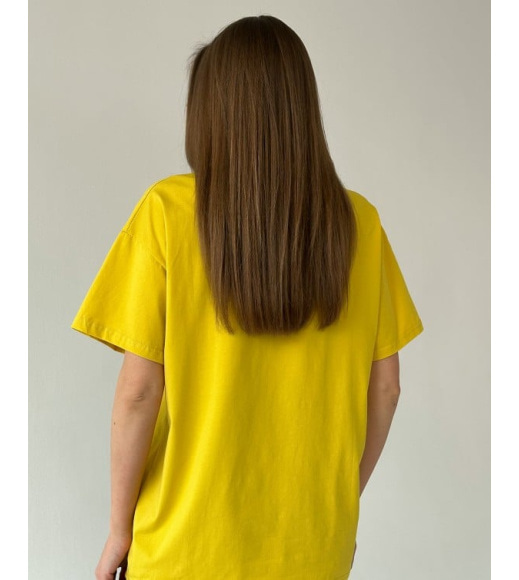 Жовта вільна футболка з нашивками