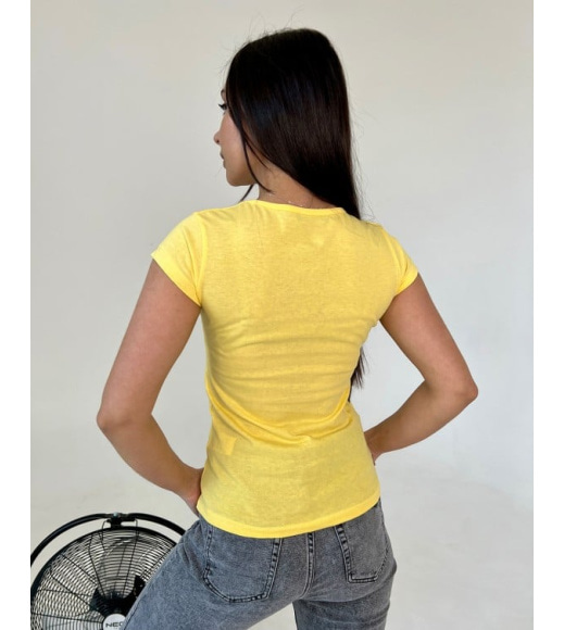 Жовта бавовняна футболка з кольоровим принтом