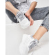 Біло-сірі сітчасті кросівки із силіконовими вставками