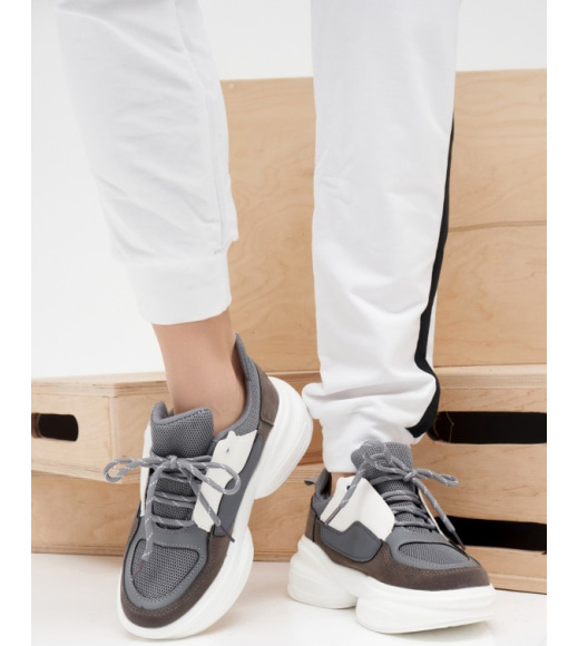 Сіро-білі комбіновані кросівки