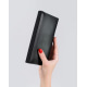 Чорний гаманець з еко-шкіри з фактурною вставкою