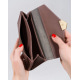 Коричневий гаманець з еко-шкіри з фактурною вставкою