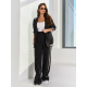 Черный брючный костюм в стиле спорт шик