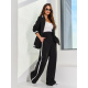 Черный брючный костюм в стиле спорт шик