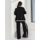 Черный брючный костюм в стиле спорт шик