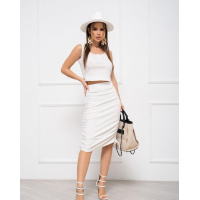 Молочный трикотажный костюм с кулисками на юбке