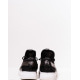 Черные кроссовки с перфорацией и белой подошвой