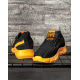Черные сетчатые кроссовки с оранжевыми вставками