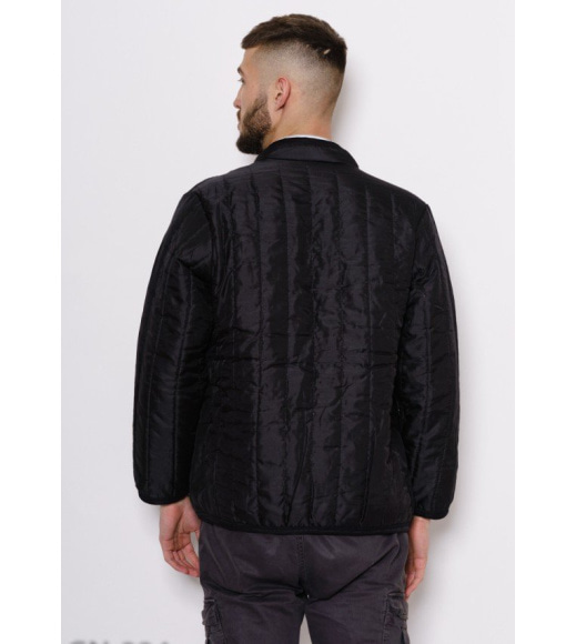 Чорна стьобана куртка на хутрі декорована потайними кишенями