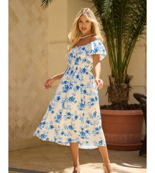 Біло-блакитна квіткова сукня з об'ємними рукавами