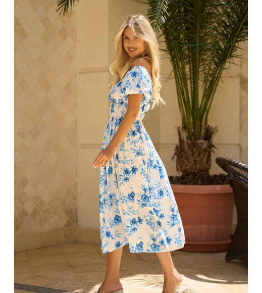 Біло-блакитна квіткова сукня з об'ємними рукавами