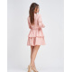 Приталенное розовое платье с нижними воланами