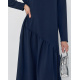 Темно-синя сукня з асиметричним воланом