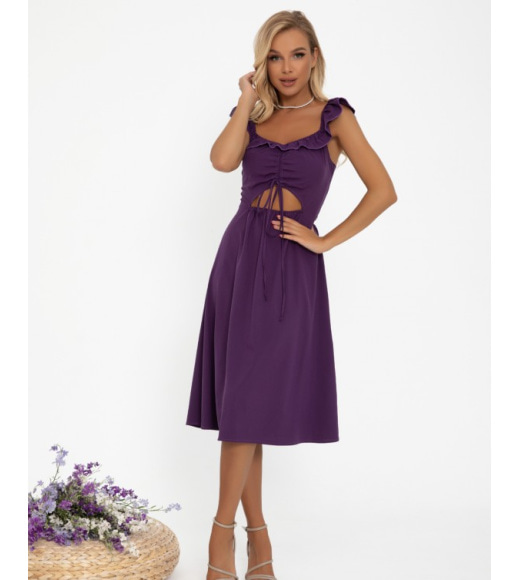 Фіолетове плаття декороване переднім вирізом
