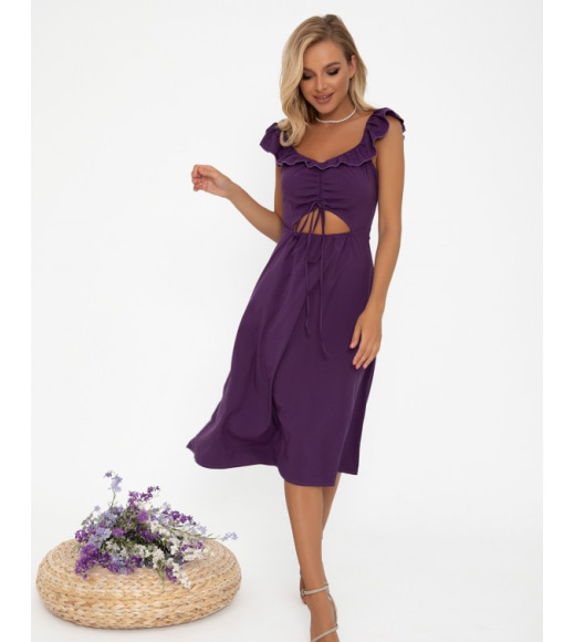 Фіолетове плаття декороване переднім вирізом