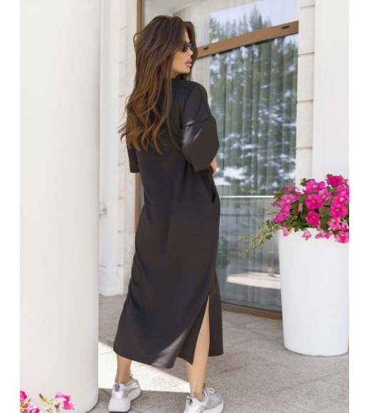 Чорна трикотажна пряма сукня з розрізами