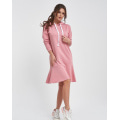Розовое трикотажное спортивное платье с воланом