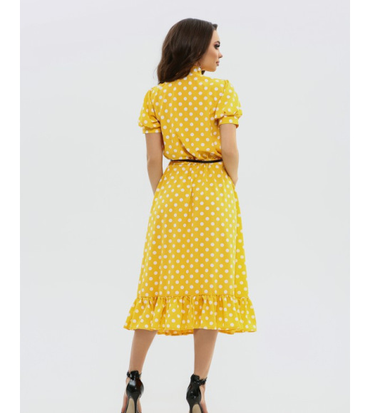 Жовта розкльошена сукня на кулісці