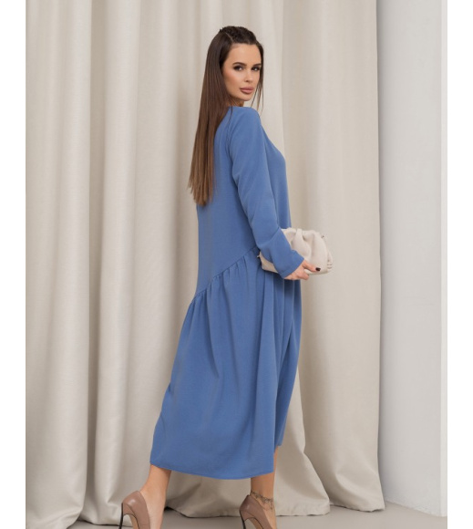 Синє плаття з асиметричним воланом