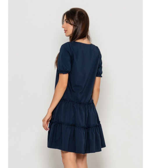 Темно-синее расклешенное платье с воланами