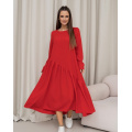 Червона сукня з асиметричним воланом