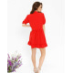 Червона сукня-трапеція з рюшами і воланами