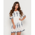 Біла котонова сукня з синьо-білою вишивкою