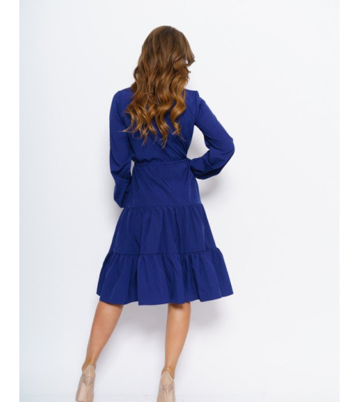 Синее расклешенное платье с воланами